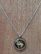 Load image into Gallery viewer, Round painted clay &quot;catharsis&quot; pendant filled with gold star sequins immersed in resin - Includes chain - Curio Memento
