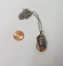 Load image into Gallery viewer, Seashell with real rainbow candy sprinkles and miniature woman immersed in clear epoxy resin - Includes chain - Curio Memento
